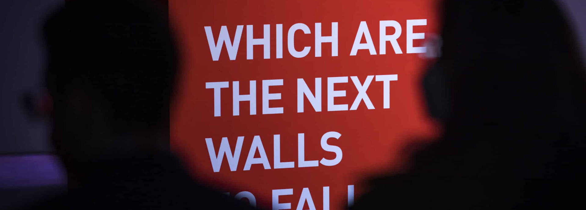 A cube at Science Summit 2021 with wirting on it: WHICH ARE THE NEXT WALLS TO FALL?