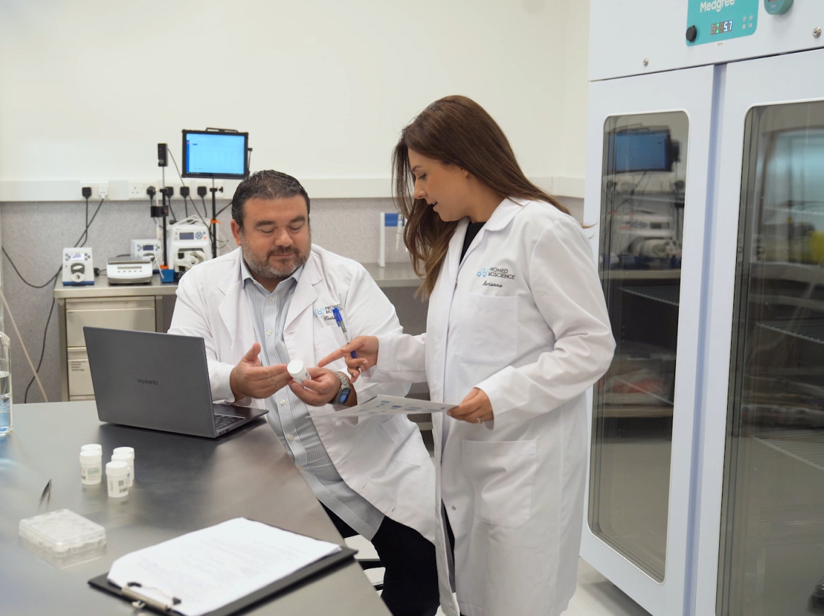 Faculty working in lab. 