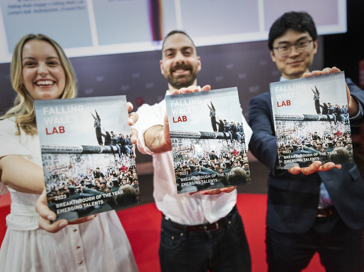 All three Falling Walls Lab Winners holding up their prizes