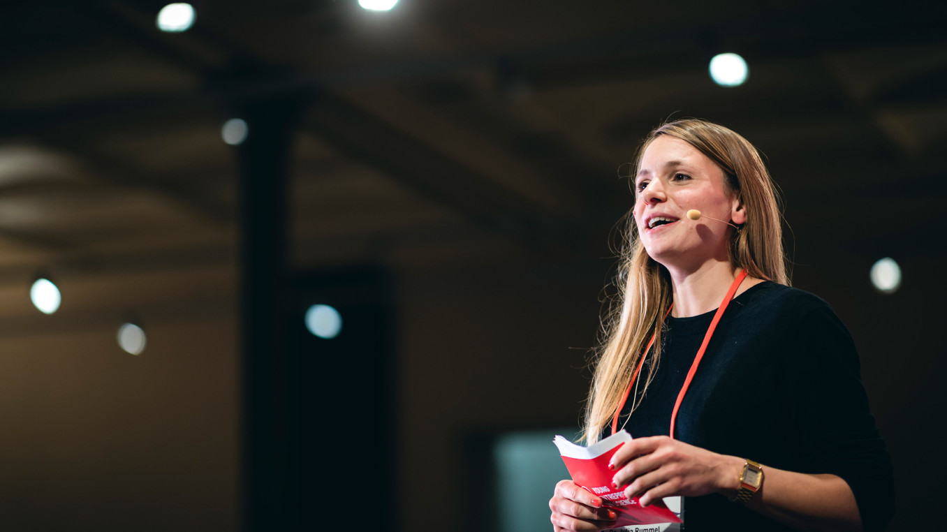 Woman on stage at Science Summit 2019